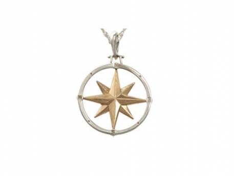 Large Compass Rose Pendant - Large SS/14k Compass Rose Pendant. Measures just over 1" across.For a thousand years travelers have relied on a compass in hand and as an icon beautifully drawn on their maps, to guide them to their destination. Wear this Compass Rose as a talisman to remind you that we are not just travelers but the navigators of our destiny.Made here in Massachusetts.